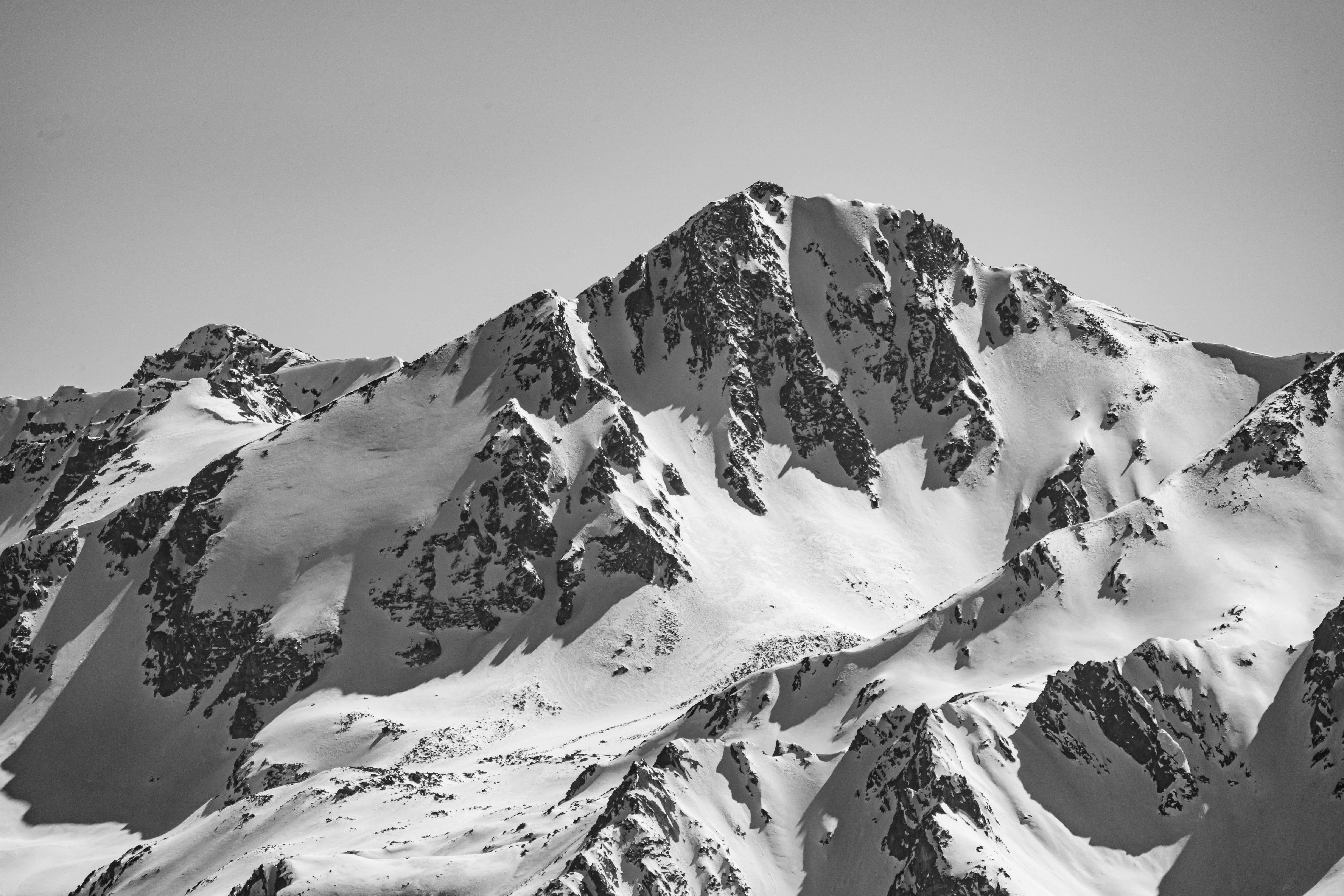 snow covered mountain during daytime